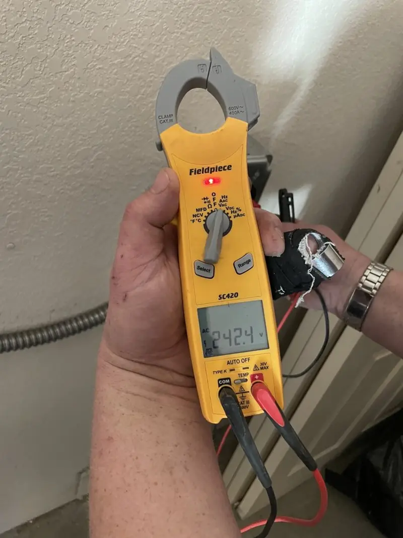 Voltage testing with clamp meter during Circuit Breaker Repair in Middlebury